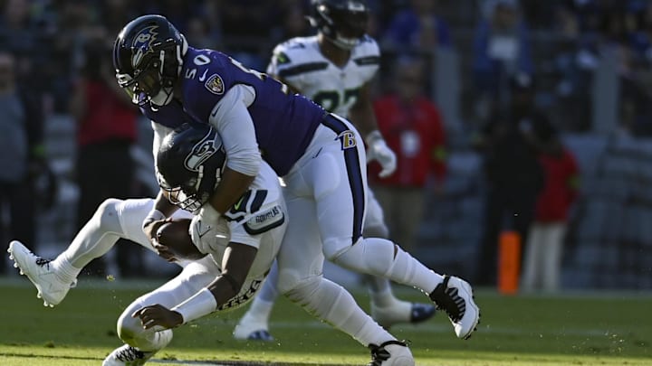 Nov 5, 2023; Baltimore, Maryland, USA; Baltimore Ravens linebacker Kyle Van Noy (50) sacks Seattle
