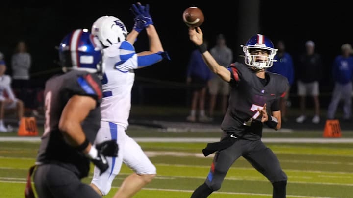 Christian Academy-Louisville’s Jackson Burke throws a complete pass to Jeffrey Vazzana against Lexington Christian Friday night.
Sept. 5, 2025