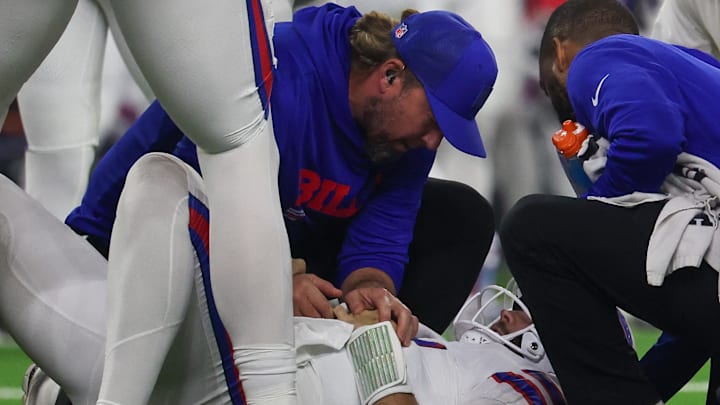 Trainers attend Buffalo Bills quarterback Josh Allen (17) after he was sacked by Houston Texans defensive end Will Anderson Jr. (51) (not pictured in the first quarter at NRG Stadium.
