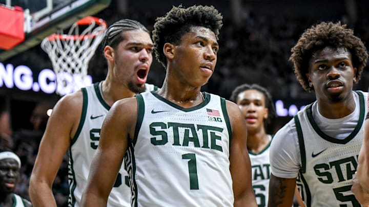 Michigan State's Jeremy Fears Jr., center, leaves the court with Jesse McCulloch, left, and Coen Carr, right, after Fears' shot to end the first half against Cornell on Monday, Dec. 29, 2025, at the Breslin Center in East Lansing.