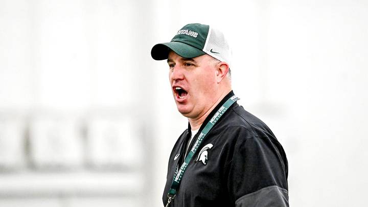 Michigan State's head coach Pat Fitzgerald calls out to players during spring football practice on Tuesday, April 14, 2026, in East Lansing.
