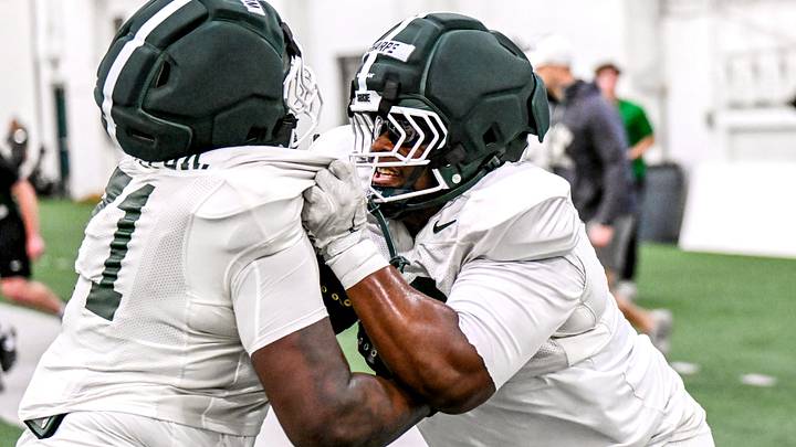 Michigan State's Nick Sharpe, right, and Robert Wright Jr. run a drill during spring football practice on Tuesday, March 24, 2026, in East Lansing. Michigan State's Nick Sharpe, right, and Robert Wright Jr. run a drill during spring football practice on Tuesday, March 24, 2026, in East Lansing.