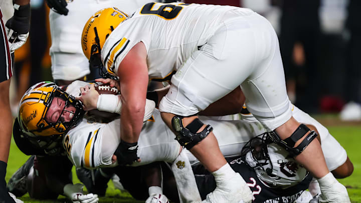 Nov 16, 2024; Columbia, South Carolina, USA; Missouri Tigers quarterback Brady Cook (12) is stopped by the South Carolina Gamecocks on a two-point conversion attempt in the second half at Williams-Brice Stadium. Mandatory Credit: Jeff Blake-Imagn Images Nov 16, 2024; Columbia, South Carolina, USA; Missouri Tigers quarterback Brady Cook (12) is stopped by the South Carolina Gamecocks on a two-point conversion attempt in the second half at Williams-Brice Stadium. Mandatory Credit: Jeff Blake-Imagn Images