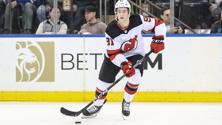 Apr 3, 2024; New York, New York, USA; New Jersey Devils center Dawson Mercer (91) controls the puck in the second period against the New York Rangers at Madison Square Garden. Mandatory Credit: Wendell Cruz-Imagn Images Apr 3, 2024; New York, New York, USA; New Jersey Devils center Dawson Mercer (91) controls the puck in the second period against the New York Rangers at Madison Square Garden. Mandatory Credit: Wendell Cruz-Imagn Images