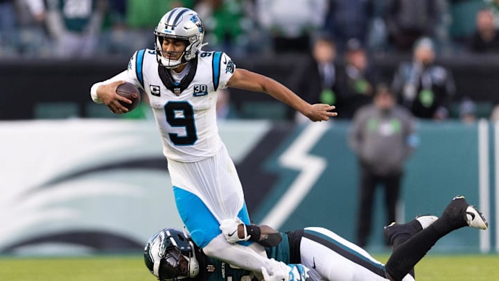 Dec 8, 2024; Philadelphia, Pennsylvania, USA;  Philadelphia Eagles linebacker Jalyx Hunt (58) tackles Carolina Panthers quarterback Bryce Young (9) during the fourth quarter at Lincoln Financial Field. Mandatory Credit: Bill Streicher-Imagn Images