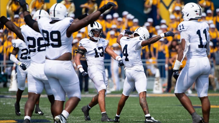 Penn State cornerback A.J. Harris (4) celebrates a pass breakup in the first half of a Nittany Lions game vs. the West Virginia Mountaineers. 