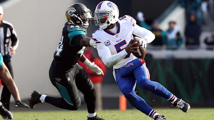 Jan 7, 2018; Jacksonville, FL, USA; Jacksonville Jaguars outside linebacker Myles Jack (44) sacks Buffalo Bills quarterback Tyrod Taylor (5) during the second half of the AFC Wild Card playoff football game at Everbank Field. Jacksonville Jaguars defeated the Buffalo Bills 10-3. Mandatory Credit: Kim Klement-Imagn Images Jan 7, 2018; Jacksonville, FL, USA; Jacksonville Jaguars outside linebacker Myles Jack (44) sacks Buffalo Bills quarterback Tyrod Taylor (5) during the second half of the AFC Wild Card playoff football game at Everbank Field. Jacksonville Jaguars defeated the Buffalo Bills 10-3. Mandatory Credit: Kim Klement-Imagn Images