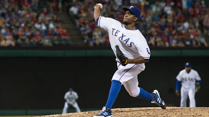 Jul 3, 2015; Arlington, TX, USA; Texas Rangers relief pitcher Neftali Feliz (30) pitches against the Los Angeles Angels during the game at Globe Life Park in Arlington. The Angels defeated the Rangers 8-2.