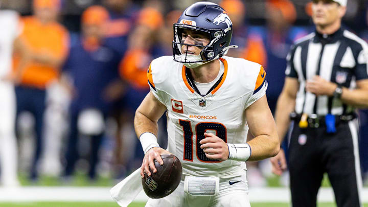 Oct 17, 2024; New Orleans, Louisiana, USA;  Denver Broncos quarterback Bo Nix (10) looks to pas downfield against the New Orleans Saints during the first half at Caesars Superdome. 