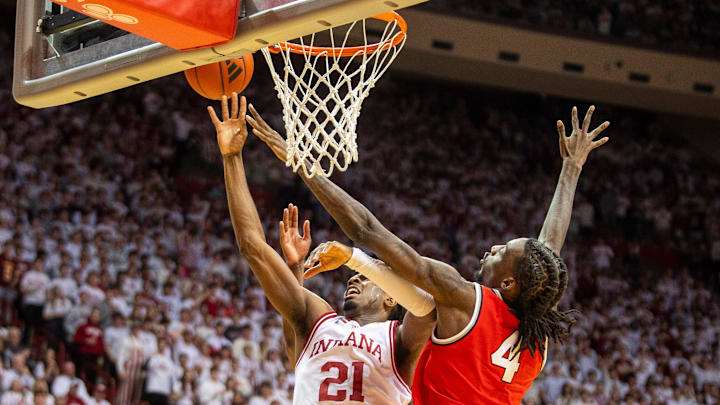 Indiana's Mackenzie Mgbako (21) shoots past Ohio State's Aaron Bradshaw (4) during the Indiana versus Ohio State men's basketball game at Simon Skjodt Assembly Hall on Saturday, March 8, 2025.