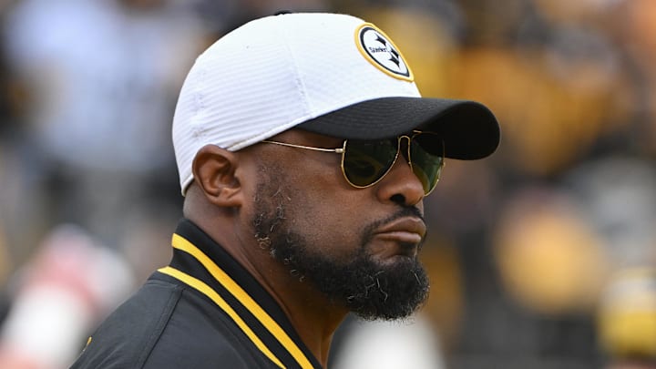 Dec 25, 2024; Pittsburgh, Pennsylvania, USA; Pittsburgh Steelers head coach Mike Tomlin watches warm ups against the Kansas City Chiefs at Acrisure Stadium. Mandatory Credit: Barry Reeger-Imagn Images