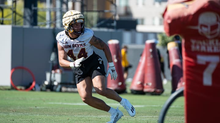 Keyshaun Elliott (44) runs through drills at Sun Devils spring football practice at ASU's Kajikawa practice fields on March 27, 2025, in Tempe, Ariz.
