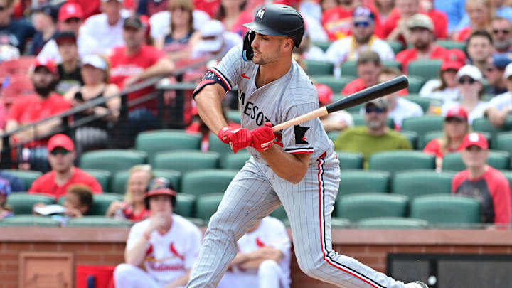 Minnesota Twins batter Matt Wallner gets a hit in the first inning against the St. Louis Cardinals at Busch Stadium in St. Louis on March 30, 2025.