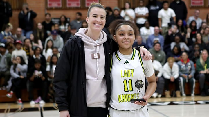 Sabrina Ionescu poses with Ontario Christian sophomore Kaleena Smith, the game's MVP after she scored 23 points in a 61-44 win over Mitty on Jan. 4 at Carondelet High School in Concord, Calif. 