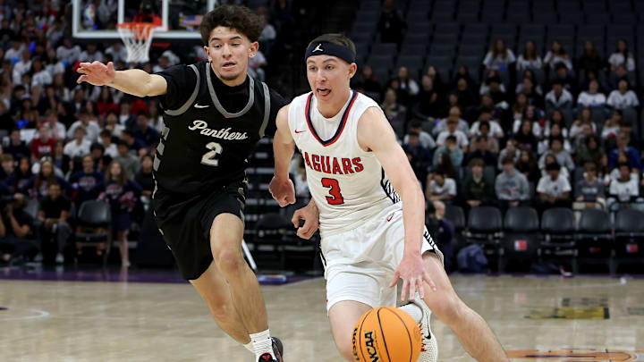 Guard Conor Maguire of International dribbles during the California (CIF) State Division 5 boys title game at Golden 1 Center in Sacramento.