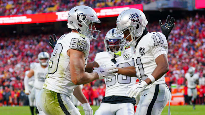 Nov 29, 2024; Kansas City, Missouri, USA; Las Vegas Raiders tight end Brock Bowers (89) celebrates with wide receiver Tre Tucker (11) after scoring against the Kansas City Chiefs during the second half at GEHA Field at Arrowhead Stadium. Mandatory Credit: Denny Medley-Imagn Images