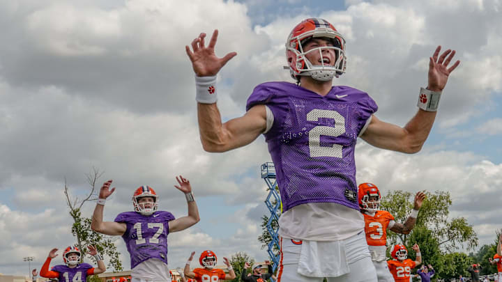 Clemson quarterback Cade Klubnik (2) and teammates warm up with “Tiger Jacks” exercise during Clemson football 2025 practice at Jersey Meadowsin Clemson, S.C. Thursday, August 6, 2025. Clemson quarterback Cade Klubnik (2) and teammates warm up with “Tiger Jacks” exercise during Clemson football 2025 practice at Jersey Meadowsin Clemson, S.C. Thursday, August 6, 2025.