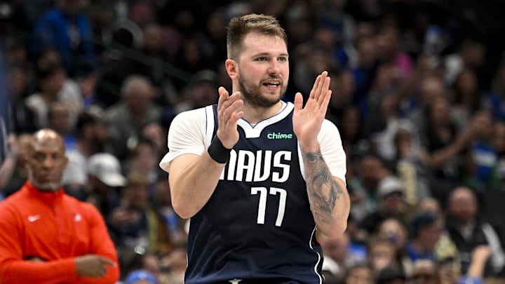Dec 23, 2024; Dallas, Texas, USA; Dallas Mavericks guard Luka Doncic (77) celebrates during the second half against the Portland Trail Blazers at the American Airlines Center. Mandatory Credit: Jerome Miron-Imagn Images
