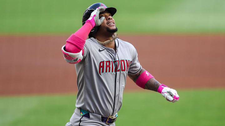 Jun 3, 2025; Atlanta, Georgia, USA; Arizona Diamondbacks second baseman Ketel Marte (4) celebrates after hitting a home run against the Atlanta Braves in the first inning at Truist Park. Mandatory Credit: Brett Davis-Imagn Images