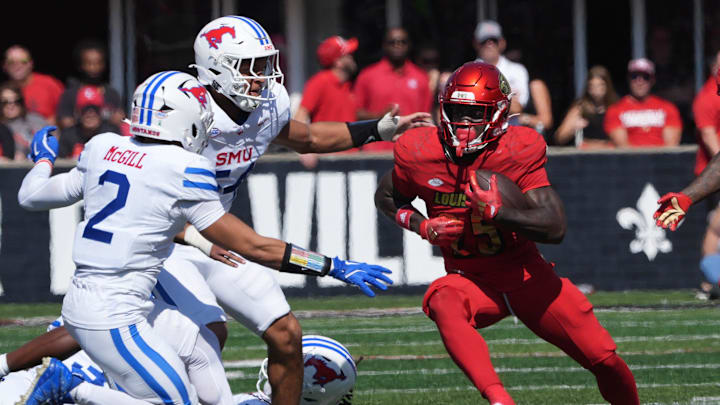 Louisville’s Isaac Brown gets a first down against SMU this Saturday.