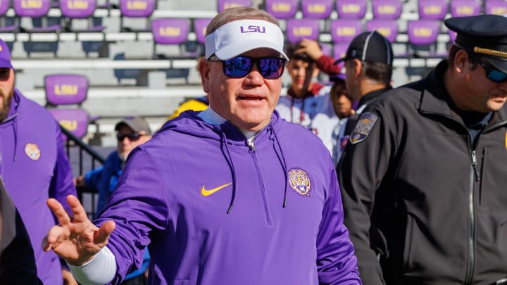 Nov 25, 2023; Baton Rouge, Louisiana, USA; LSU Tigers head coach Brian Kelly waves to fans during warmups before the game against the Texas A&M Aggies at Tiger Stadium. Nov 25, 2023; Baton Rouge, Louisiana, USA; LSU Tigers head coach Brian Kelly waves to fans during warmups before the game against the Texas A&M Aggies at Tiger Stadium.