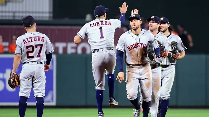 Houston Astros outfielder George Springer (4) high-fives teammates after beating the Baltimore Orioles. Houston Astros outfielder George Springer (4) high-fives teammates after beating the Baltimore Orioles.