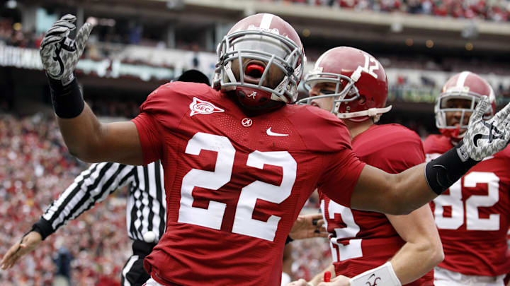 Nov 26, 2010; Tuscaloosa, AL, USA; Alabama Crimson Tide running  back Mark Ingram (22) celebrates a touchdown against the Auburn Tigers during the first half at Bryant-Denny Stadium. Mandatory Credit: John Reed-Imagn Images