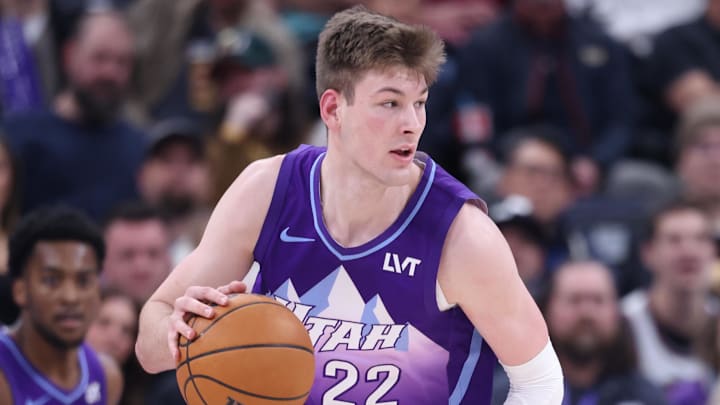 Feb 22, 2025; Salt Lake City, Utah, USA; Utah Jazz forward Kyle Filipowski (22) brings the ball up the court against the Houston Rockets during the first half at Delta Center. Mandatory Credit: Rob Gray-Imagn Images