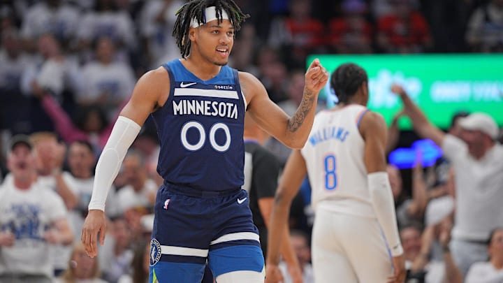 May 24, 2025; Minneapolis, Minnesota, USA; Minnesota Timberwolves guard Terrence Shannon Jr. (00) reacts against the Oklahoma City Thunder during the first half in game three of the western conference finals for the 2025 NBA Playoffs at Target Center. Mandatory Credit: Brad Rempel-Imagn Images