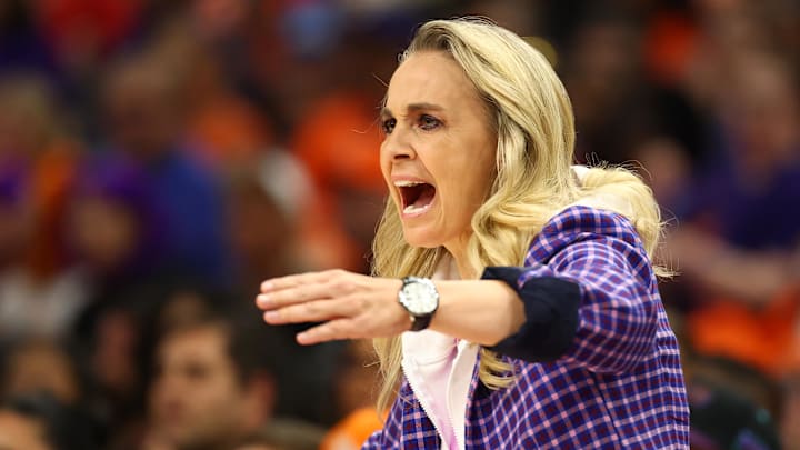 Oct 8, 2025; Phoenix, Arizona, USA; Las Vegas Aces head coach Becky Hammon reacts against the Phoenix Mercury in the first half during game three of the 2025 WNBA Finals at PHX Arena. Mandatory Credit: Mark J. Rebilas-Imagn Images