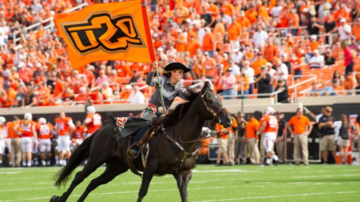 Sep 19, 2015; Stillwater, OK, USA; Oklahoma State Cowboys Bullet rides across the field against the UTSA Roadrunners during the second half at Boone Pickens Stadium. OSU won 69-14. Mandatory Credit: Rob Ferguson-Imagn Images