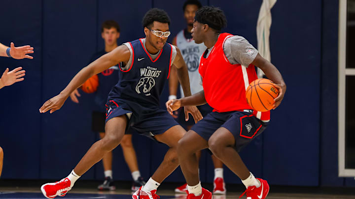 Arizona's Bryce James playing defense in practice