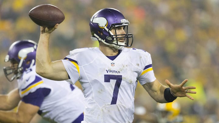 Oct 2, 2014; Green Bay, WI, USA; Minnesota Vikings quarterback Christian Ponder (7) during the game against the Green Bay Packers at Lambeau Field.  Green Bay won 42-10.