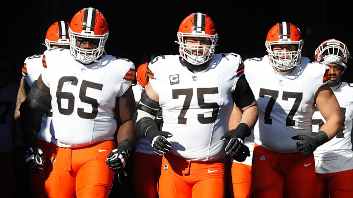 Dec 8, 2024; Pittsburgh, Pennsylvania, USA;  Cleveland Browns guards Germain Ifedi (65) and Joel Bitonio (75) and Wyatt Teller (77) take the field to play the Pittsburgh Steelers at Acrisure Stadium.
