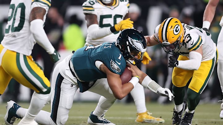 Jalen Hurts rushes the ball against the Green Bay Packers in the NFL wild card. 
