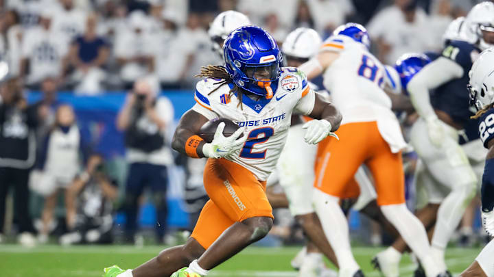 Dec 31, 2024; Glendale, AZ, USA; Boise State Broncos running back Ashton Jeanty (2) against the Penn State Nittany Lions during the Fiesta Bowl at State Farm Stadium. Mandatory Credit: Mark J. Rebilas-Imagn Images