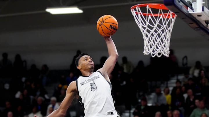 Millennium forward Cameron Holmes (3) dunks against Sunnyslope during a game at Millennium High School in Goodyear on Jan. 23, 2025.