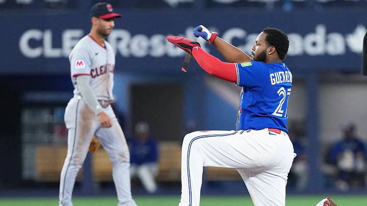 Apr 25, 2026: Toronto Blue Jays first baseman Vladimir Guerrero Jr. (27) celebrates getting on second base against the Cleveland Guardians during the sixth inning at Rogers Centre. Credit: Nick Turchiaro-Imagn Images