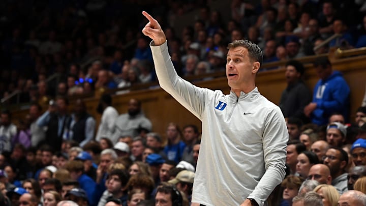 Nov 21, 2025; Durham, North Carolina, USA; Duke Blue Devils head coach Jon Scheyer directs his team during the second half against the Niagara Purple Eagles at Cameron Indoor Stadium. Mandatory Credit: Rob Kinnan-Imagn Images