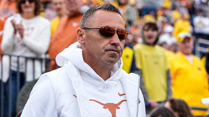 Texas head coach Steve Sarkisian takes the field for warm ups at Michigan Stadium. Texas head coach Steve Sarkisian takes the field for warm ups at Michigan Stadium.