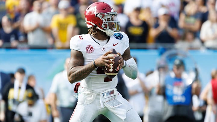 Alabama Crimson Tide QB Jalen Milroe looks to throw against the Michigan Wolverines.
