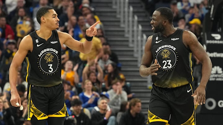 Golden State Warriors guard Jordan Poole (3) and forward Draymond Green (23) celebrate during the second quarter against the Utah Jazz at Chase Center. Mandatory Credit: Darren Yamashita-Imagn Images