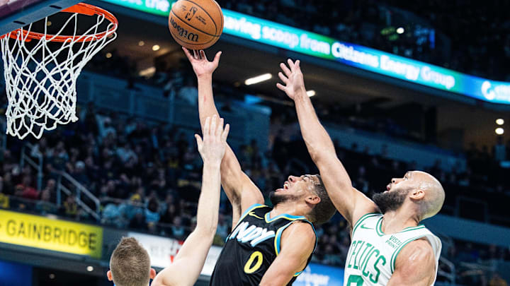Dec 4, 2023; Indianapolis, Indiana, USA; Indiana Pacers guard Tyrese Haliburton (0) shoots while