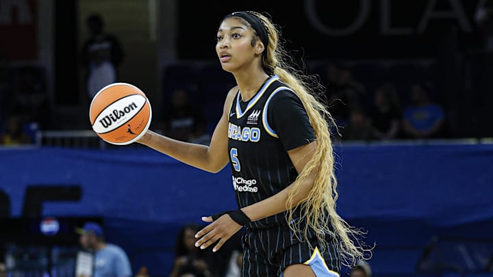 Jul 12, 2025; Chicago, Illinois, USA; Chicago Sky forward Angel Reese (5) controls the ball against the Minnesota Lynx during the second half of a WNBA game at Wintrust Arena. Mandatory Credit: Kamil Krzaczynski-Imagn Images