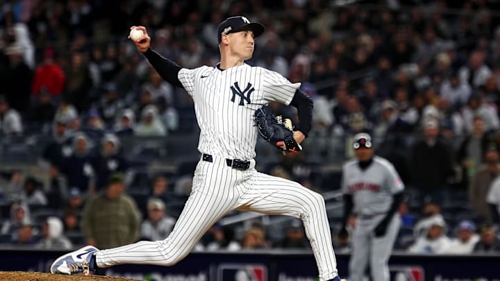 Oct 15, 2024; Bronx, New York, USA; New York Yankees pitcher Luke Weaver (30) pitches during the ninth inning against the Cleveland Guardians in game two of the ALCS for the 2024 MLB Playoffs at Yankee Stadium. Oct 15, 2024; Bronx, New York, USA; New York Yankees pitcher Luke Weaver (30) pitches during the ninth inning against the Cleveland Guardians in game two of the ALCS for the 2024 MLB Playoffs at Yankee Stadium.