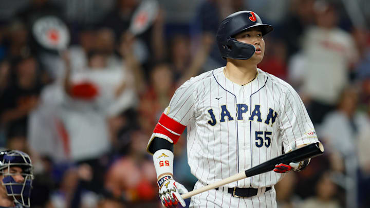 Mar 21, 2023; Miami, Florida, USA; Japan third baseman Munetaka Murakami (55) looks on after hitting a home run during the second inning against USA at LoanDepot Park. Mandatory Credit: Sam Navarro-Imagn Images