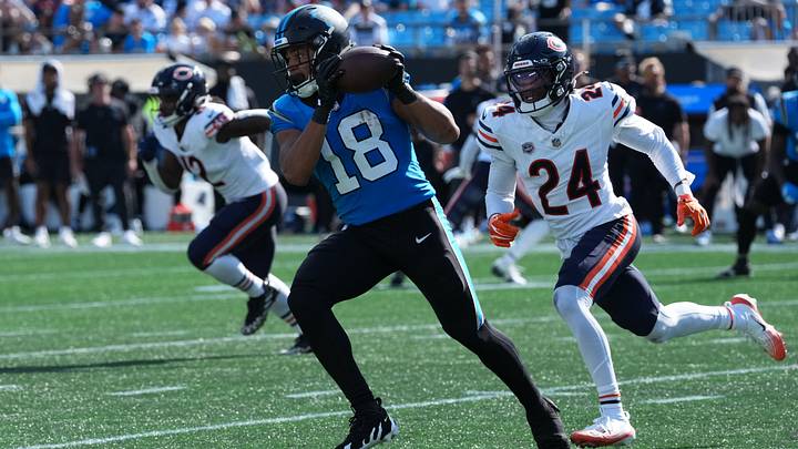 Carolina Panthers wide receiver Jalen Coker (18) makes a catch while defended by Chicago Bears cornerback Malik Muhammad II (24) in the fourth quarter at Bank of America Stadium. Mandatory Credit: Jim Dedmon-Imagn Images Carolina Panthers wide receiver Jalen Coker (18) makes a catch while defended by Chicago Bears cornerback Malik Muhammad II (24) in the fourth quarter at Bank of America Stadium. Mandatory Credit: Jim Dedmon-Imagn Images