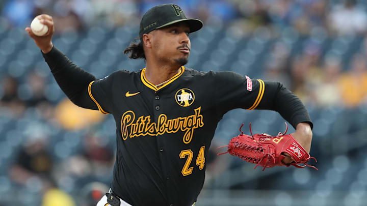 Aug 4, 2025; Pittsburgh, Pennsylvania, USA;  Pittsburgh Pirates starting pitcher Johan Oviedo (24) delivers a pitch against the San Francisco Giants during the first inning at PNC Park. Mandatory Credit: Charles LeClaire-Imagn Images