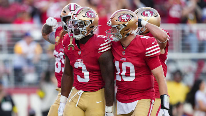 Nov 9, 2025; Santa Clara, California, USA; San Francisco 49ers running back Brian Robinson Jr. (3) and San Francisco 49ers quarterback Mac Jones (10) celebrate after a touchdown during the third quarter against the Los Angeles Rams at Levi's Stadium. Mandatory Credit: Cary Edmondson-Imagn Images