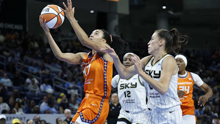 Aug 23, 2025; Chicago, Illinois, USA; Connecticut Sun guard Leila Lacan (47) drives to the basket against Chicago Sky guard Sevgi Uzun (0) during the first half at Wintrust Arena. Mandatory Credit: Kamil Krzaczynski-Imagn Images
